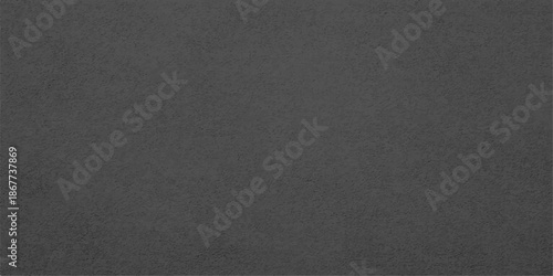A dark black leather and fabric material background featuring a rough textured surface with a macro closeup design of blank textile skin and grey cloth canvas for a fashion wallpaper backdrop