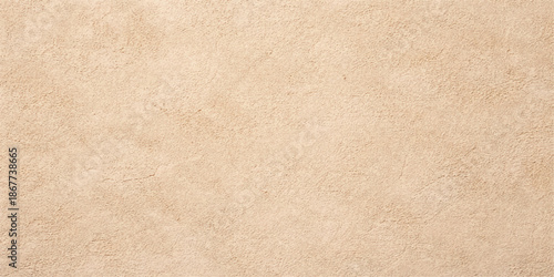 Aged brown kraft paper texture with a rough vintage grunge pattern on a blank antique parchment surface for an old beige cardboard background design