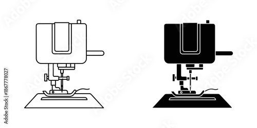 Two sewing machines one black and one white on fabric