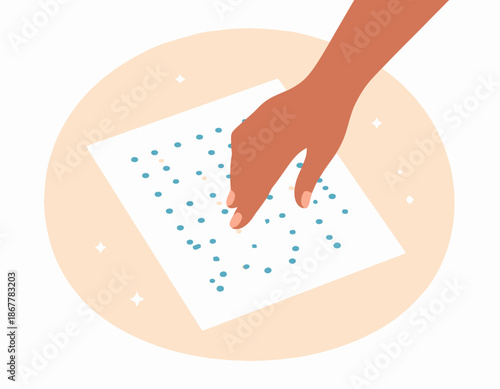 Close-up of a hand touching a sheet of paper with small blue dots arranged in a pattern, symbolizing data or information