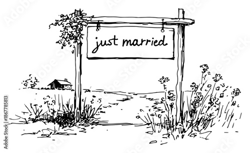 Rustic wooden signpost with just married text standing in countryside landscape