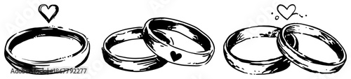 Set of wedding rings and bands with heart icons in sketch style