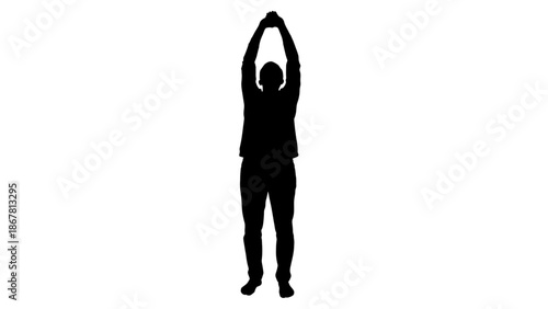 A silhouette of a man standing with his arms raised above his head in a stretching motion