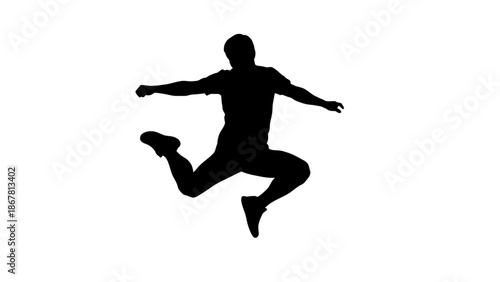 Silhouette of a man jumping in the air with arms outstretched