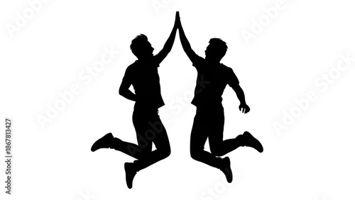 Two people in silhouette jumping and giving a high five to each other in mid air