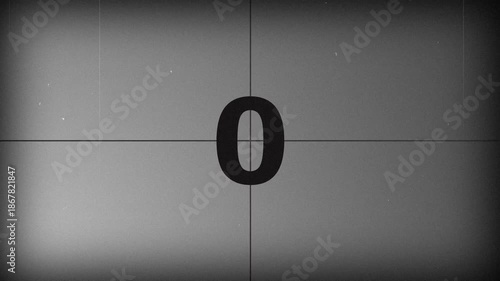 4K resolution old film countdown animation. 5 second countdown with noise and dust effect.