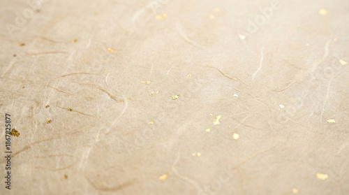 Korean traditional handmade paper Hanji texture background with gold flakes representing luxury and culture