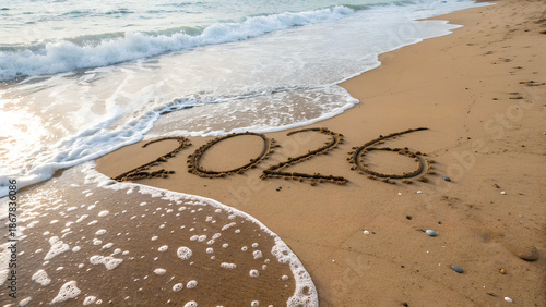 Wallpaper Mural number 2026 write on sandy beach for new year, with ripple sea wave crashing with white bubble, 2026 New Year celebration concept
 Torontodigital.ca