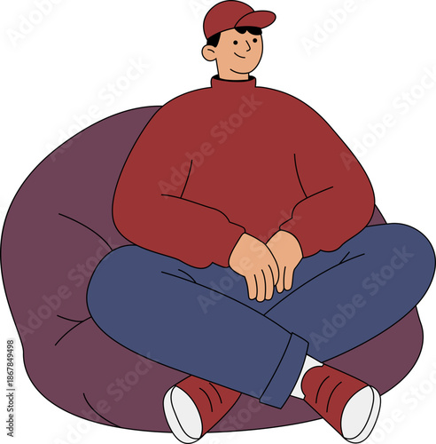 Young Man Relaxing Comfortably on a Bean Bag Chair