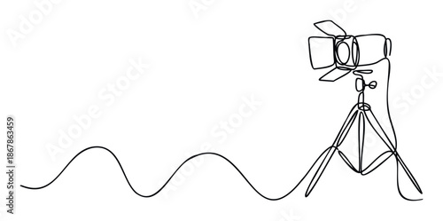 Minimalist one line drawing of a studio spotlight on a tripod with a flowing line, perfect for creative presentations, media industry branding, or graphic design projects.