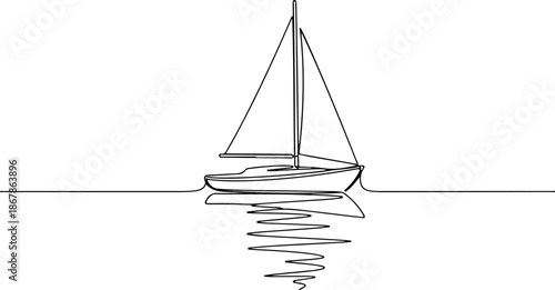Sailboat floating on calm water with sails deployed