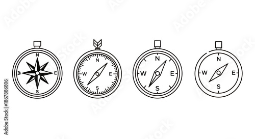 Set of four different black and white compass illustrations showing various navigation designs.