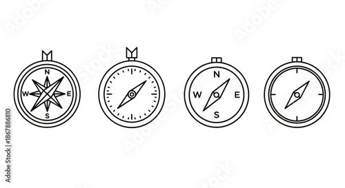Set of four simple black and white compass illustrations with different needle designs.