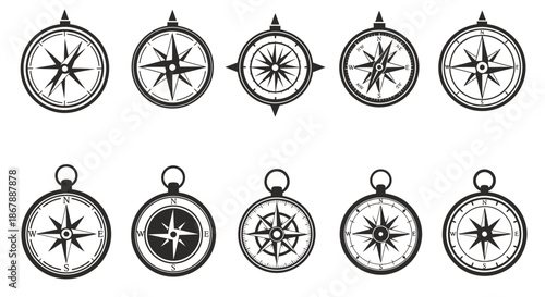 Set of ten different black and white compass icons with various designs and styles.