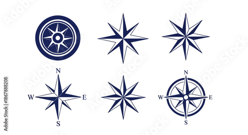 Set of six different navy blue compass rose icons with various designs and directional indicators.