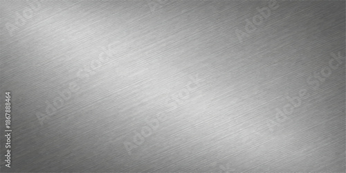 Shiny brushed metal texture background featuring a silver stainless steel plate surface with a light metallic gray pattern and textured aluminum material backdrop