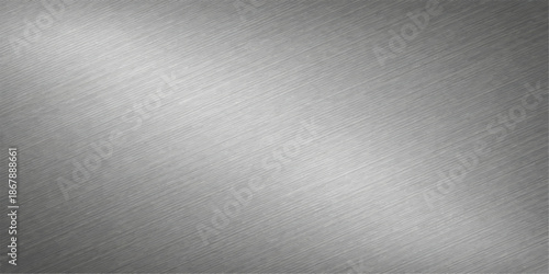 A textured silver stainless steel plate backdrop featuring a brushed metallic pattern on a shiny light gray aluminum surface