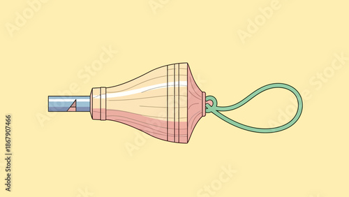 Vintage wooden spinning top toy with string on light background.