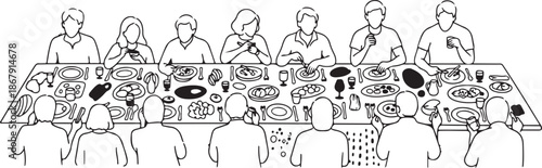 People sitting at a long table eating and socializing together