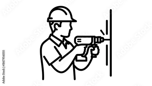 Construction worker drilling into wall with power drill