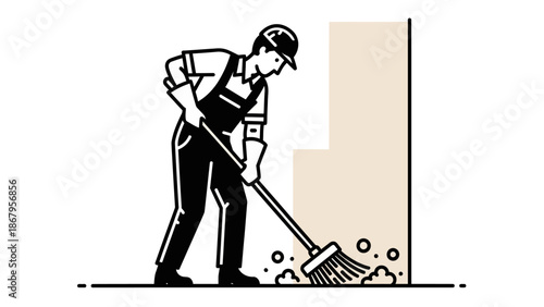 Man wearing overalls using a broom to sweep dust and debris on the floor