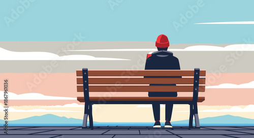 A lone individual in a red beanie sits on a park bench, gazing at a serene landscape under a beautiful pastel sky, evoking peaceful contemplation and solitude.