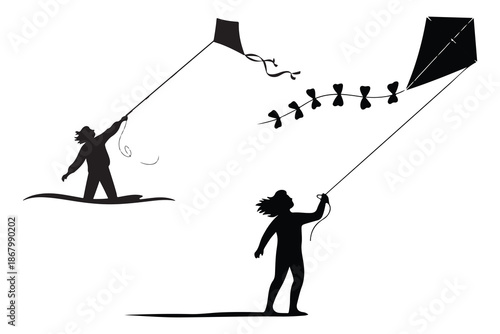 Two Children Flying Kites on a Beach silhouette