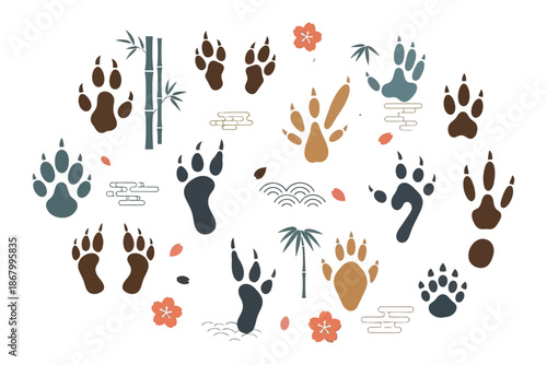 Collection of animal paw prints and wildlife tracking symbols.