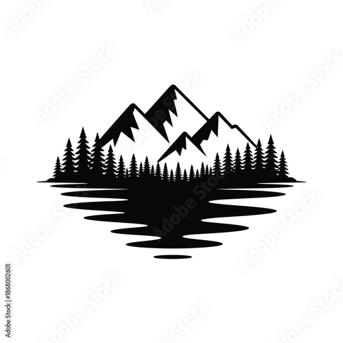 Serene mountain landscape with trees reflected in calm water