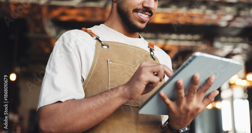 Fotografie Restaurant, hands or waiter reading with tablet, table management or browsing online service platform