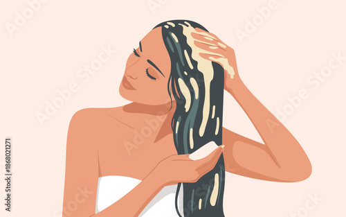 Woman washing her long hair with shampoo in the bathroom