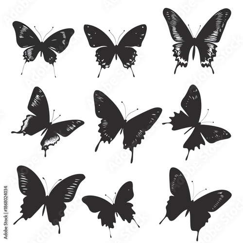 A collection of black silhouette butterflies in varying flight poses , vector style simple color