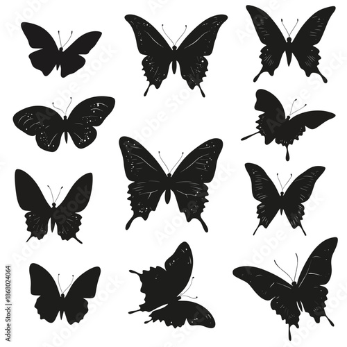 A collection of black silhouette butterflies in varying flight poses , vector style simple color