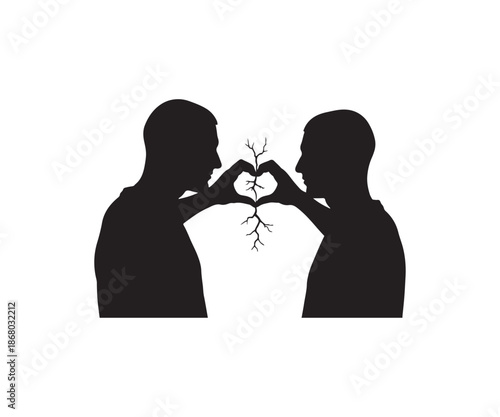 Loving couple sharing tender moment with heart shaped hands.