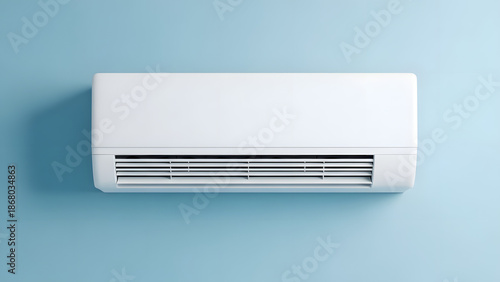 Wall mounted white air conditioning unit on light blue background