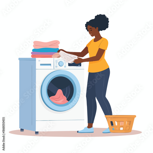 A woman doing laundry in a domestic setting with a washing machine and clothes basket