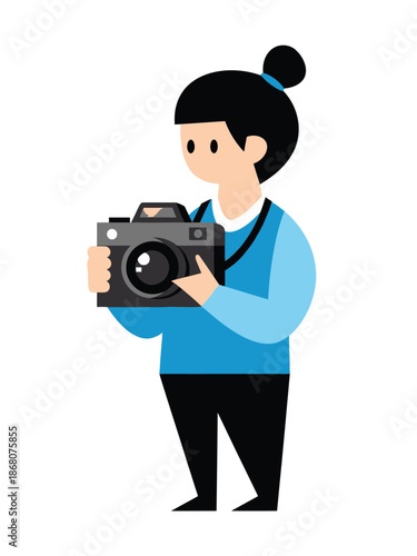 Young person holding a vintage camera ready to take a photo.