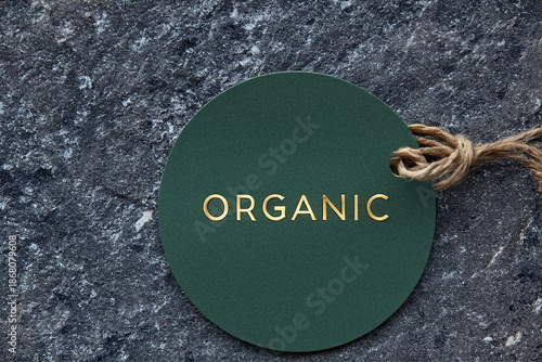 Organic label mockup on round travertine stone.
