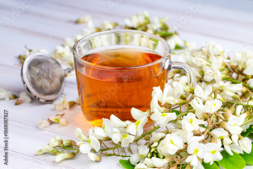 Glass cup of herbal acacia tea