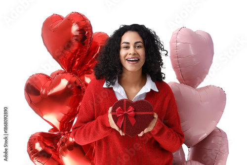 Smiling young woman holding...