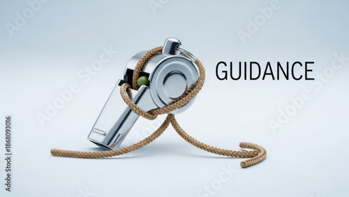 A silver whistle with a brown rope wrapped around it on a white background with the word GUIDANCE