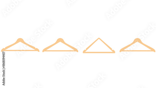 Four wooden coat hangers on a white background for organization