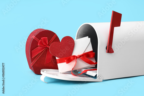 Mailbox with letters and gi...