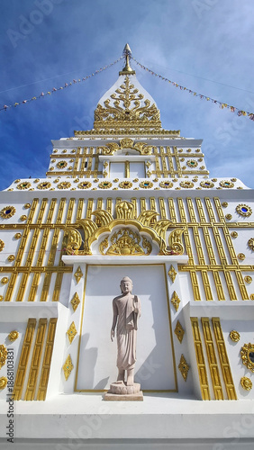 white buddhist temple with statue of buddha