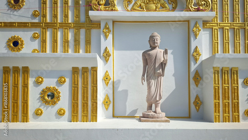 white buddhist temple with statue of buddha