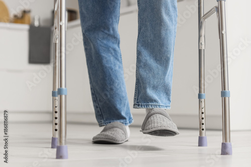 Legs of senior man with wal...