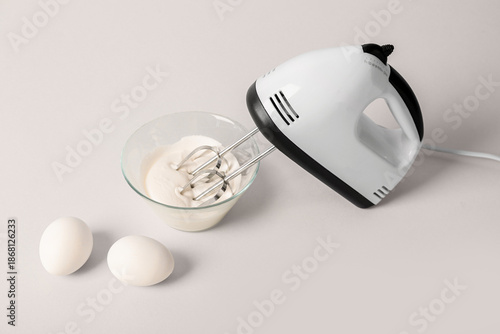Electric mixer with eggs an...
