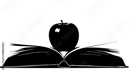 A Silhouette of an open book with an apple placed on top. A concept of education and knowledge