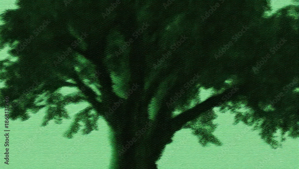 Fototapeta premium Silhouette of a tree against a green background, creating a serene atmosphere.