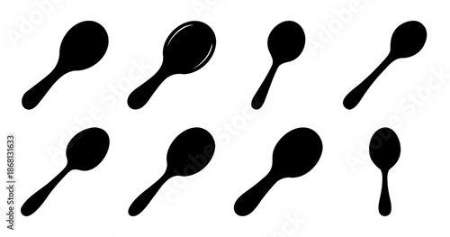 Black Spoons Assortment in a Pattern on a White Background Design